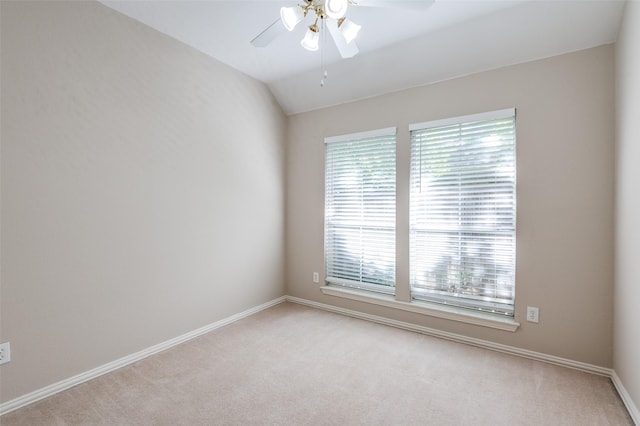 3002 Chukar Dr, Mckinney, TX 75072 - spare room with plenty of natural light, light carpet, ceiling fan, and lofted ceiling