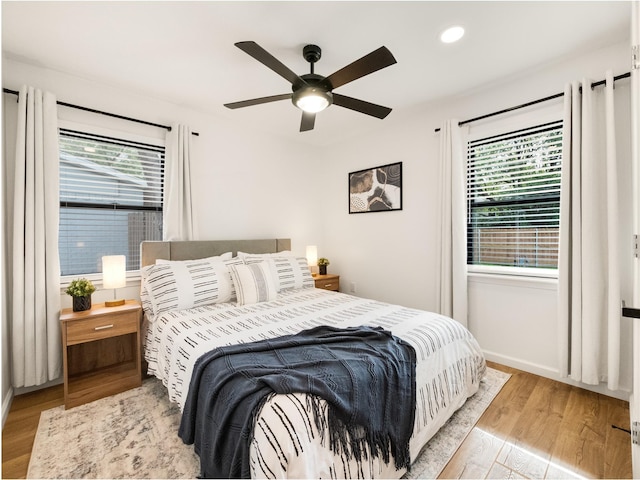 445 Melrose Dr, Richardson, TX 75080 - bedroom featuring wood finished floors, recessed lighting, a ceiling fan, and baseboards