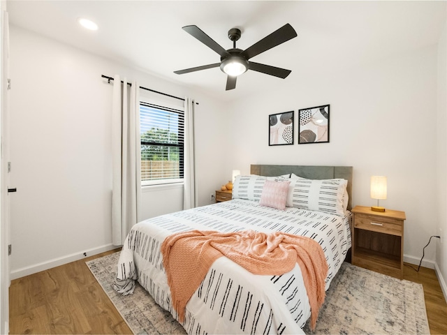445 Melrose Dr, Richardson, TX 75080 - bedroom featuring wood finished floors, baseboards, ceiling fan, and recessed lighting