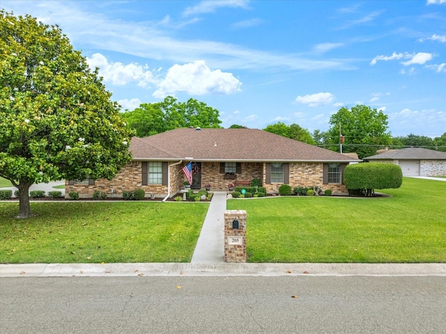 205 Brookview Dr, Decatur, TX 76234 - ranch-style house with a front lawn and roof with shingles