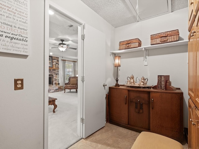 205 Brookview Dr, Decatur, TX 76234 - hallway with a textured ceiling and light carpet