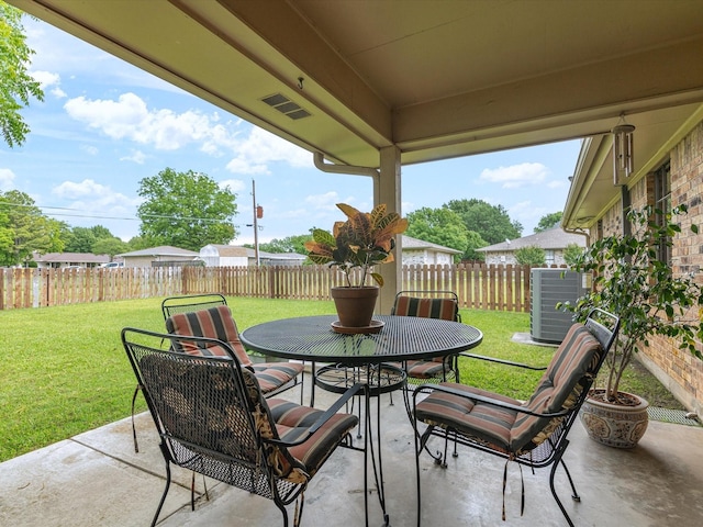 205 Brookview Dr, Decatur, TX 76234 - view of patio featuring outdoor dining space and cooling unit