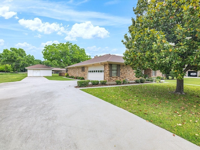 205 Brookview Dr, Decatur, TX 76234 - view of front facade with brick siding, a front lawn, and concrete driveway