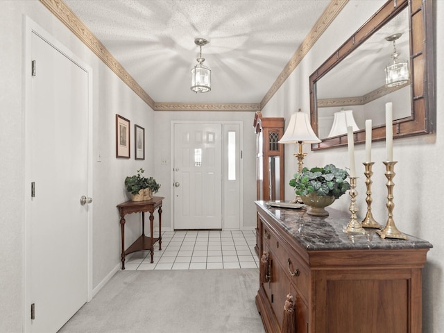 205 Brookview Dr, Decatur, TX 76234 - foyer entrance with light tile patterned floors, light colored carpet, a textured ceiling, and baseboards