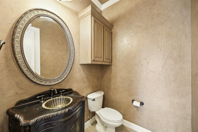 1270 Timber Ln, Frisco, TX 75036 - bathroom featuring vanity, toilet, crown molding, and baseboards