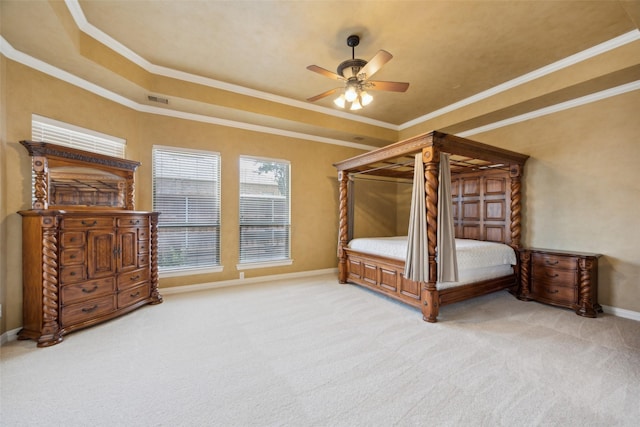 1270 Timber Ln, Frisco, TX 75036 - carpeted bedroom with ornamental molding, baseboards, a tray ceiling, and a ceiling fan