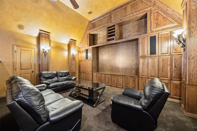 1270 Timber Ln, Frisco, TX 75036 - cinema featuring dark carpet, wood walls, and high vaulted ceiling