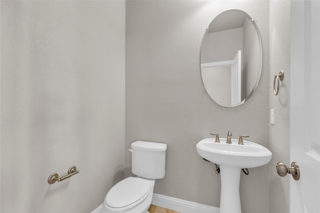 405 Calvert Dr, Midlothian, TX 76065 - bathroom with toilet and baseboards