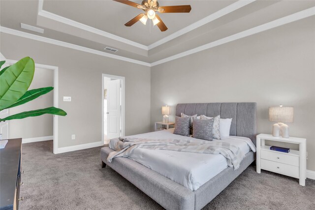 405 Calvert Dr, Midlothian, TX 76065 - carpeted bedroom with a tray ceiling, baseboards, crown molding, and ceiling fan