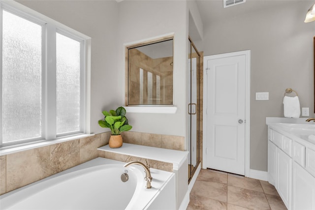 405 Calvert Dr, Midlothian, TX 76065 - full bath with a bath, a stall shower, vanity, and tile patterned flooring