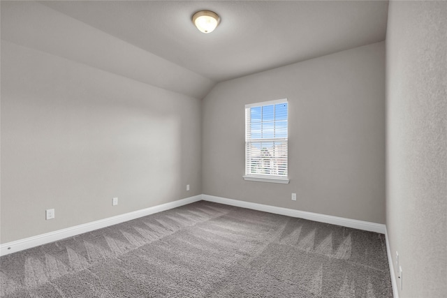 405 Calvert Dr, Midlothian, TX 76065 - unfurnished room with carpet flooring, baseboards, and lofted ceiling