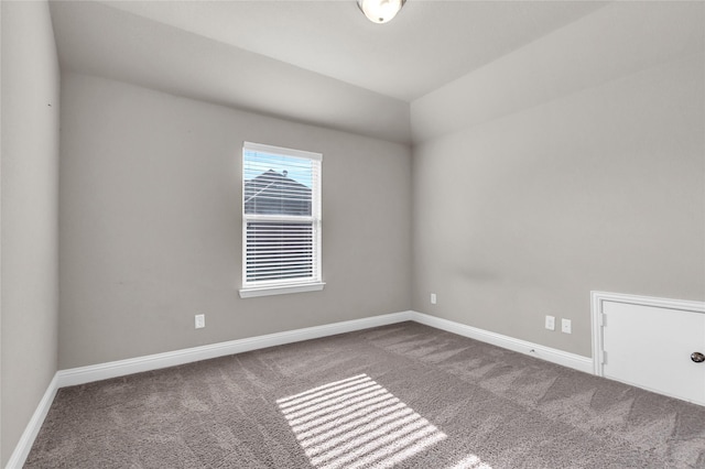 405 Calvert Dr, Midlothian, TX 76065 - carpeted spare room with baseboards and lofted ceiling