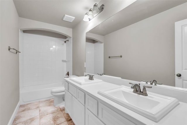 405 Calvert Dr, Midlothian, TX 76065 - bathroom featuring toilet, double vanity, shower / washtub combination, and baseboards