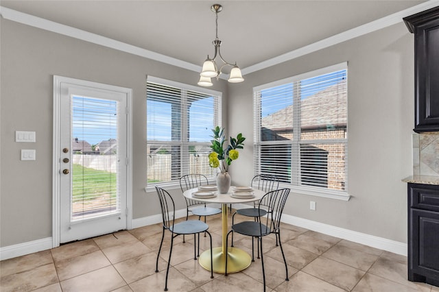 405 Calvert Dr, Midlothian, TX 76065 - dining space featuring crown molding, healthy amount of natural light, baseboards, and a chandelier