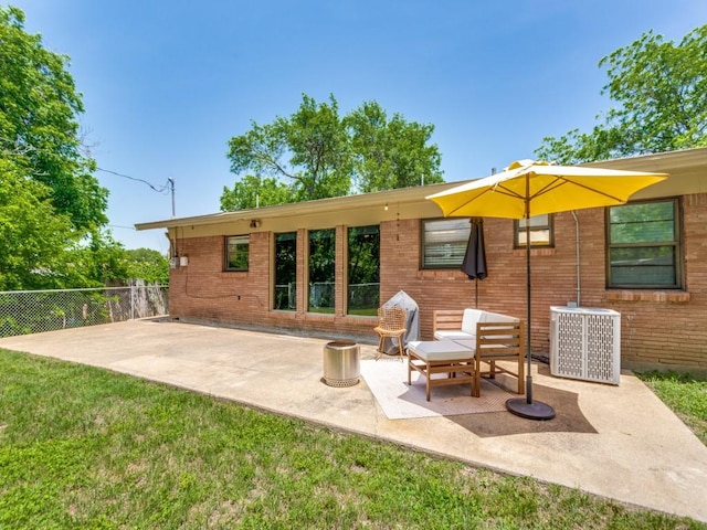 5408 Waltham Ave, Fort Worth, TX 76133 - rear view of house featuring a patio and brick siding