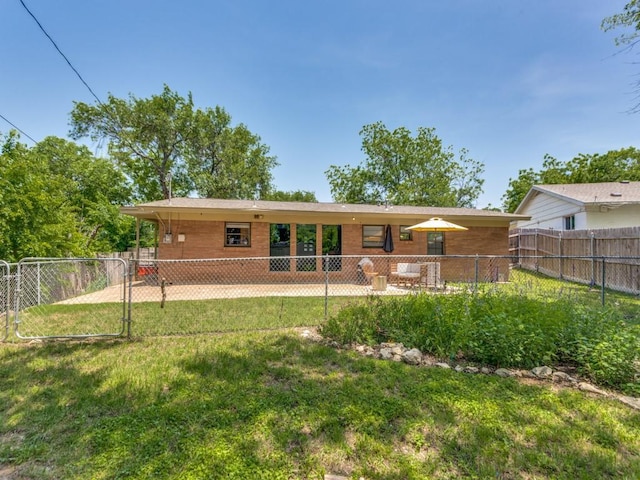 5408 Waltham Ave, Fort Worth, TX 76133 - back of property with a fenced backyard and a patio
