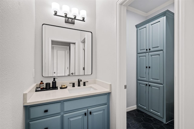 903 Crescent Dr, Highland Village, TX 75077 - bathroom with crown molding, vanity, tile patterned flooring, and baseboards