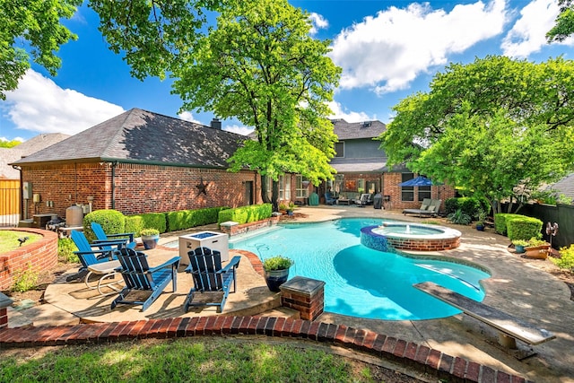 903 Crescent Dr, Highland Village, TX 75077 - view of swimming pool with a patio, a pool with connected hot tub, fence, and a diving board