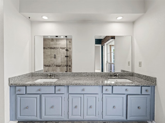 12605 Burninglog Ln, Dallas, TX 75243 - bathroom with a stall shower and double vanity