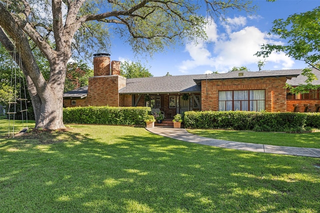 4549 Walnut Hill Ln, Dallas, TX 75229 - single story home featuring a chimney, a front lawn, brick siding, and a shingled roof