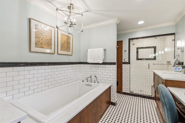 4549 Walnut Hill Ln, Dallas, TX 75229 - full bathroom with tile walls, ornamental molding, a stall shower, vanity, and a bath