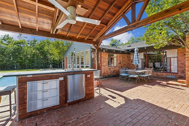4549 Walnut Hill Ln, Dallas, TX 75229 - view of patio / terrace with area for grilling, outdoor dining space, and ceiling fan