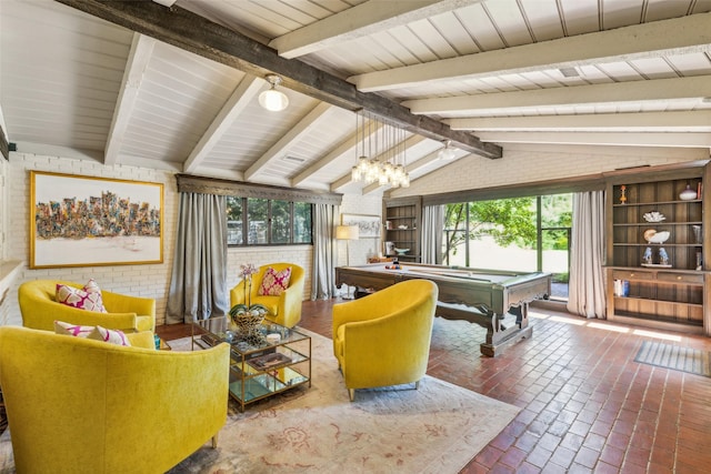 4549 Walnut Hill Ln, Dallas, TX 75229 - living room with billiards table, plenty of natural light, and brick floors
