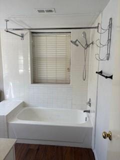 151 Henry M Chandler Dr Unit P, Rockwall, TX 75032 - bathroom with wood finished floors, vanity, and shower / tub combination