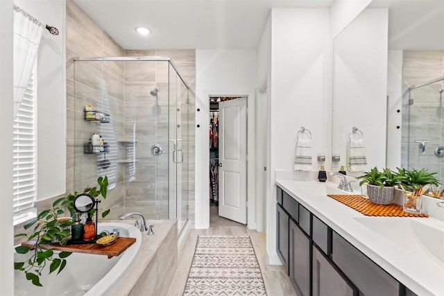 3942 Oak Crk, Denison, TX 75020 - full bath featuring a shower stall, a garden tub, and double vanity