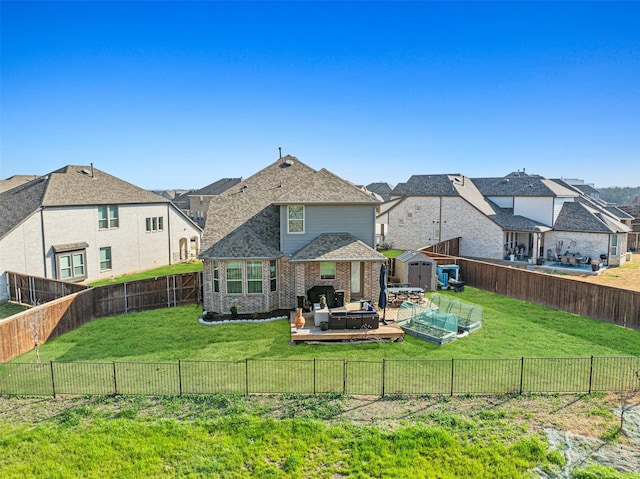 3942 Oak Crk, Denison, TX 75020 - rear view of house with a shed, a residential view, an outdoor structure, outdoor lounge area, and a wooden deck
