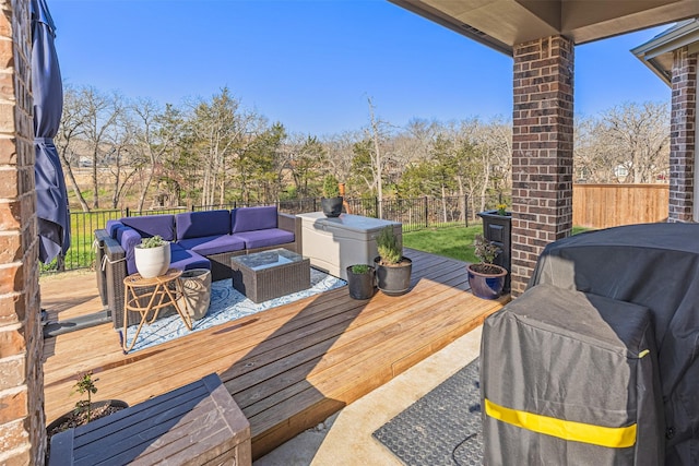 3942 Oak Crk, Denison, TX 75020 - wooden terrace with outdoor lounge area, a fenced backyard, and grilling area