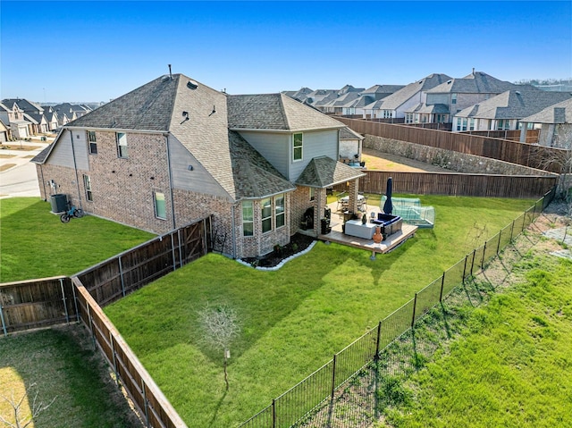3942 Oak Crk, Denison, TX 75020 - back of property featuring brick siding, a residential view, roof with shingles, and an outdoor living space
