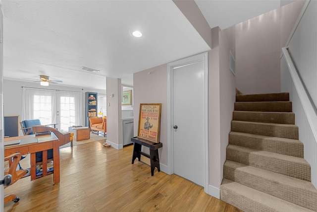 8400 Hickory St Unit 103, Frisco, TX 75034 - stairs featuring wood finished floors, ceiling fan, recessed lighting, and baseboards