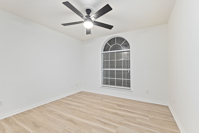 1275 Shores Blvd, Rockwall, TX 75087 - spare room featuring wood finished floors, ceiling fan, and baseboards