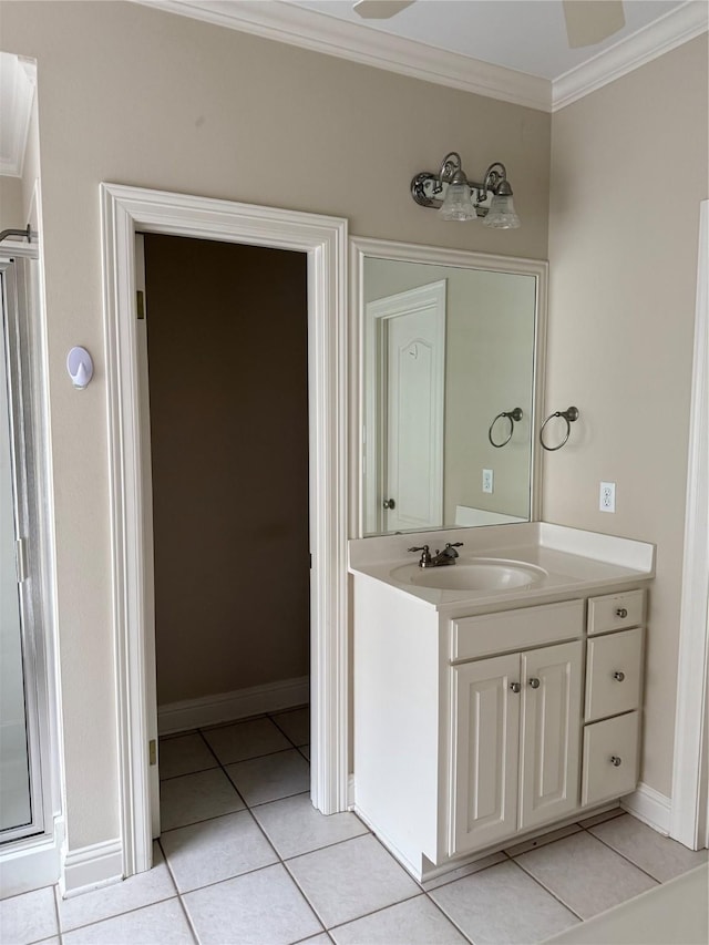 5714 Ferrell Dr, Shreveport, LA 71129 - bathroom with ornamental molding, tile patterned flooring, vanity, and baseboards