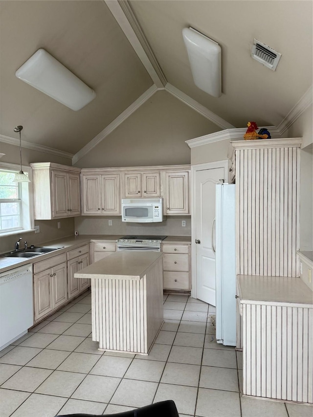 5714 Ferrell Dr, Shreveport, LA 71129 - kitchen featuring white appliances, a sink, light countertops, a center island, and vaulted ceiling