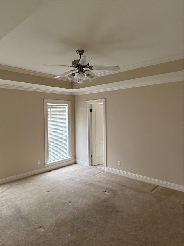5714 Ferrell Dr, Shreveport, LA 71129 - carpeted spare room with crown molding, a ceiling fan, baseboards, and a raised ceiling