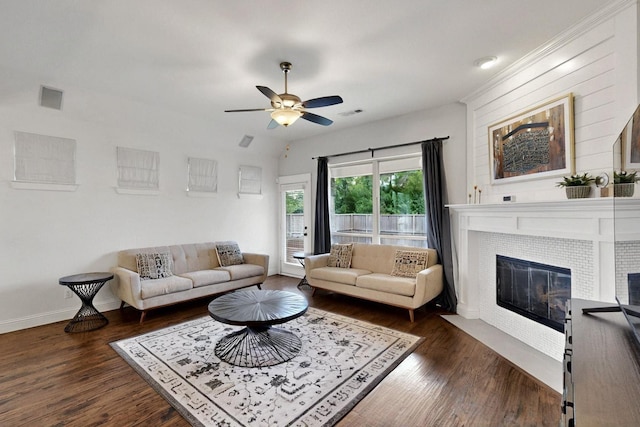 3716 Alder Dr, Mckinney, TX 75071 - living area with a ceiling fan, wood finished floors, a fireplace with flush hearth, and baseboards