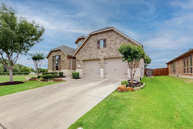 3716 Alder Dr, Mckinney, TX 75071 - view of front of home featuring driveway, brick siding, stone siding, and an attached garage