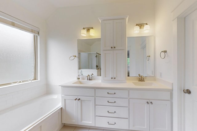 3716 Alder Dr, Mckinney, TX 75071 - full bathroom with a stall shower, double vanity, a bath, and lofted ceiling
