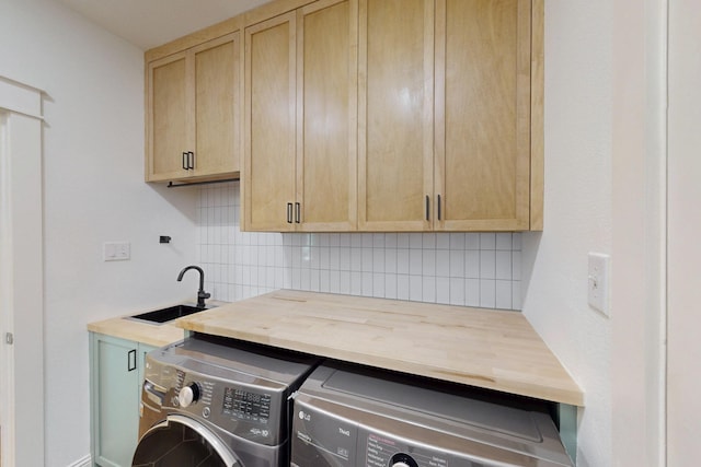 3716 Alder Dr, Mckinney, TX 75071 - clothes washing area with washing machine and dryer and cabinet space