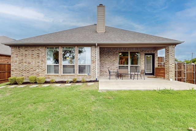 3716 Alder Dr, Mckinney, TX 75071 - rear view of property featuring brick siding, a chimney, a patio, and a shingled roof