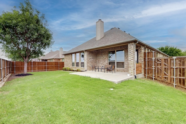 3716 Alder Dr, Mckinney, TX 75071 - rear view of house featuring a chimney, brick siding, a patio, and a shingled roof