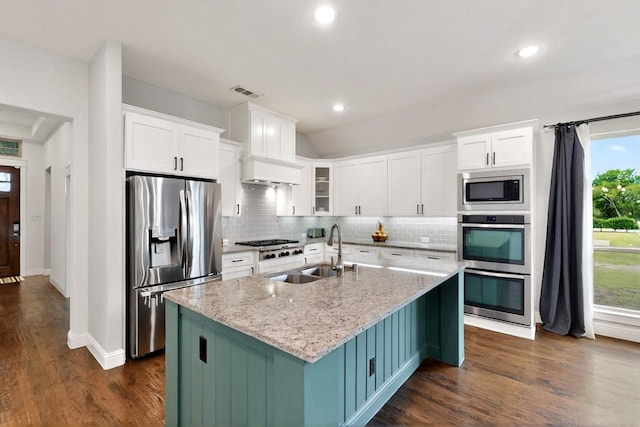 3716 Alder Dr, Mckinney, TX 75071 - kitchen featuring stainless steel appliances, a sink, white cabinetry, an island with sink, and recessed lighting