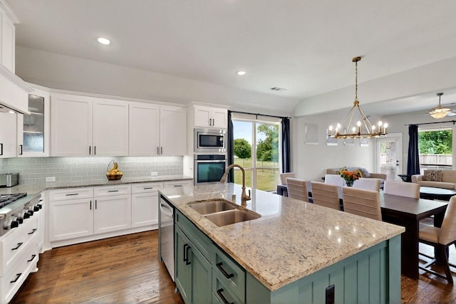 3716 Alder Dr, Mckinney, TX 75071 - kitchen featuring a sink, appliances with stainless steel finishes, white cabinets, tasteful backsplash, and a chandelier
