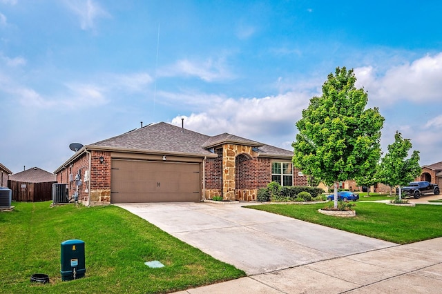 1911 Meadow Crest Dr, Princeton, TX 75407 - single story home with stone siding, central air condition unit, a front lawn, and a garage