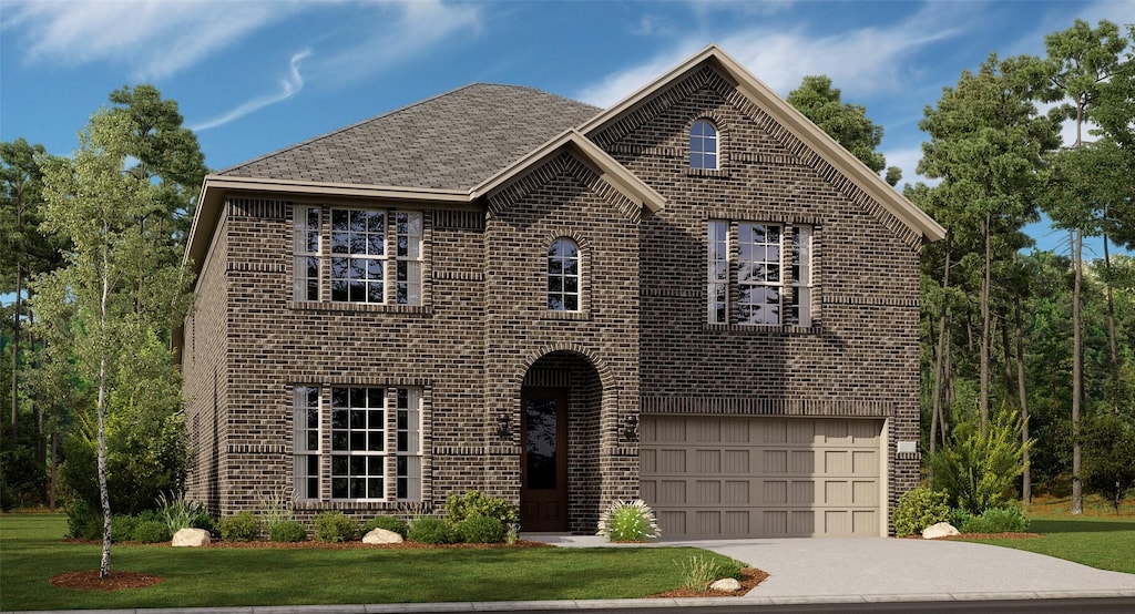 820 Enys Rd, Mckinney, TX 75069 - traditional-style home featuring brick siding, a garage, driveway, and a front yard
