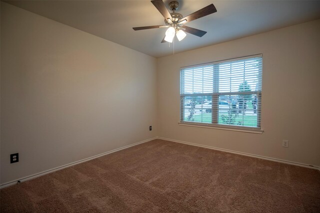 1543 Meadowlake Dr, Waxahachie, TX 75165 - unfurnished room featuring carpet, baseboards, and ceiling fan