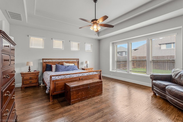 2139 Devonblue Dr, Forney, TX 75126 - bedroom featuring a tray ceiling, dark wood-style floors, baseboards, and a ceiling fan