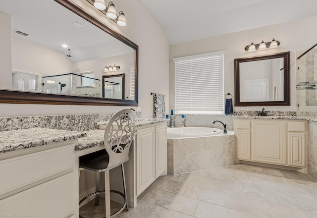 2139 Devonblue Dr, Forney, TX 75126 - bathroom featuring lofted ceiling, a shower stall, a garden tub, plenty of natural light, and two vanities